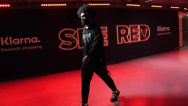 Chicago Bulls guard Coby White (0) enters the building before the game against the Minnesota Timberwolves at United Center.
