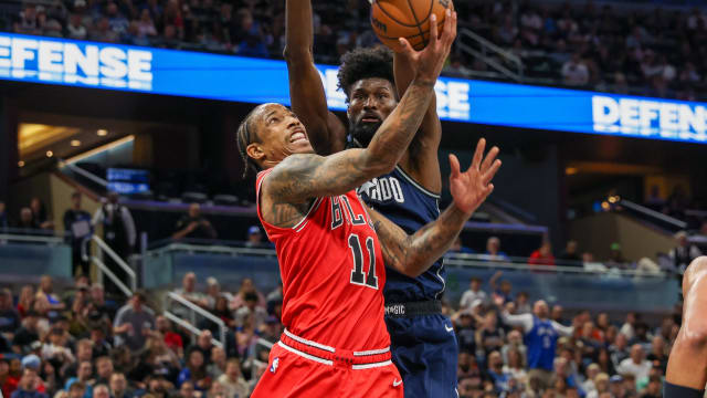 Chicago Bulls forward DeMar DeRozan (11) goes to the basket against Orlando Magic forward Jonathan Isaac (1) during the second half at KIA Center.