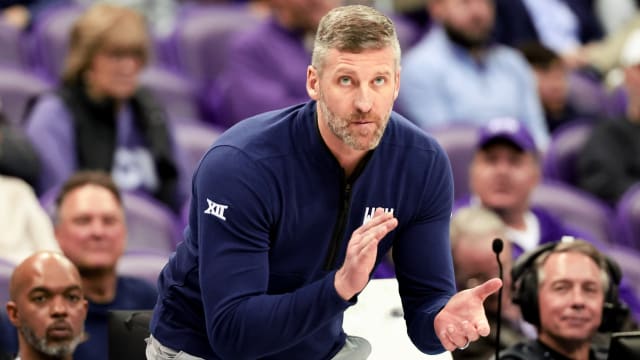 Feb 12, 2024; Fort Worth, Texas, USA; West Virginia Mountaineers head coach Josh Eilert reacts during the second half against the TCU Horned Frogs at Ed and Rae Schollmaier Arena.
