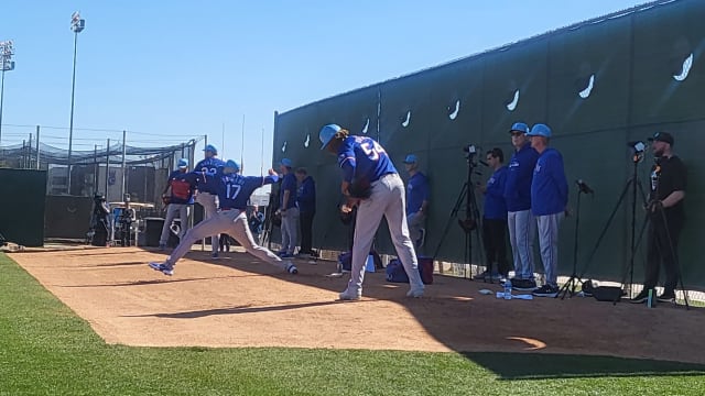 Texas Rangers pitchers, from right, including José Ureña, Nathan Eovaldi, Dane Dunning, and Danny Duffy, threw a bullpen session on Wednesday, the first day of Rangers spring training camp in Surprise, Ariz. Position players report by Monday.