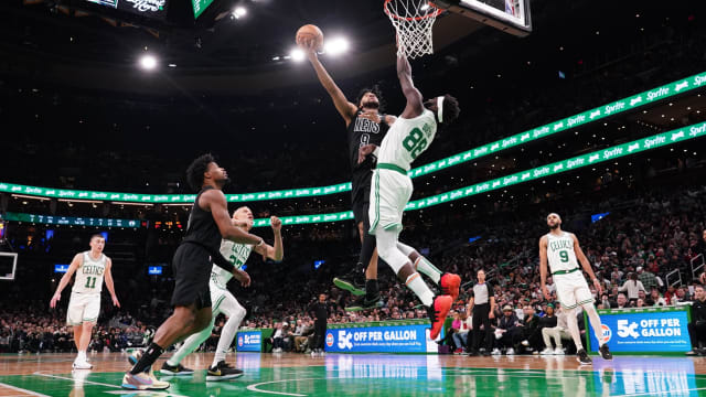  Brooklyn Nets forward Trendon Watford (9) shoots against Boston Celtics center Neemias Queta (88) in the second half at TD Garden.