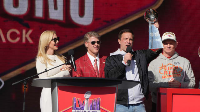Feb 14, 2024; Kansas City, MO, USA; Kansas City Chiefs general manager Brett Veach speaks as owner Clark Hunt and wife Tavia Hunt and play-by-play announcer Mitch Holthus listen during the celebration of the Chiefs winning Super Bowl LVIII. Mandatory Credit: Kirby Lee-USA TODAY Sports  