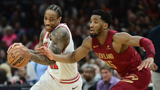 Chicago Bulls forward DeMar DeRozan (11) drives to the basket against Cleveland Cavaliers guard Donovan Mitchell (45) during the second half at Rocket Mortgage FieldHouse. 