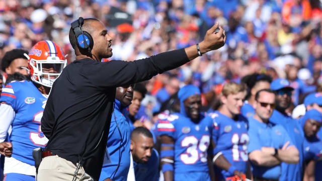 Florida Gators interim defensive coordinator Christian Robinson yells to his players during a game against Florida State University at Ben Hill Griffin Stadium in Gainesville Fla., Nov. 27, 2021. Flagi 112721 Ufvfsu Fans 12