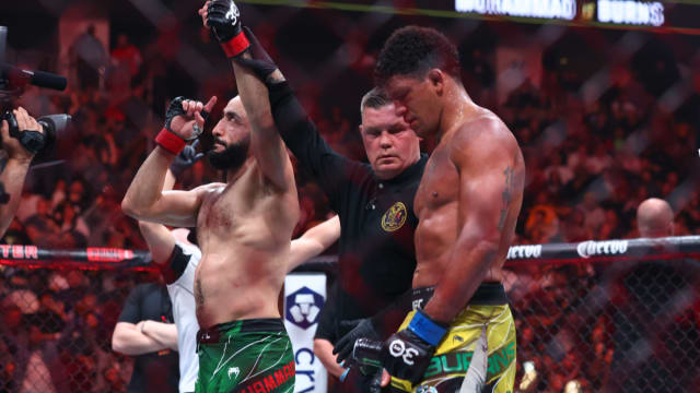 May 6, 2023; Newark, New Jersey, USA; Belal Muhammad (red gloves) reacts after defeating Gilbert Burns (blue gloves) during UFC 288 at Prudential Center. Mandatory Credit: Ed Mulholland-USA TODAY Sports