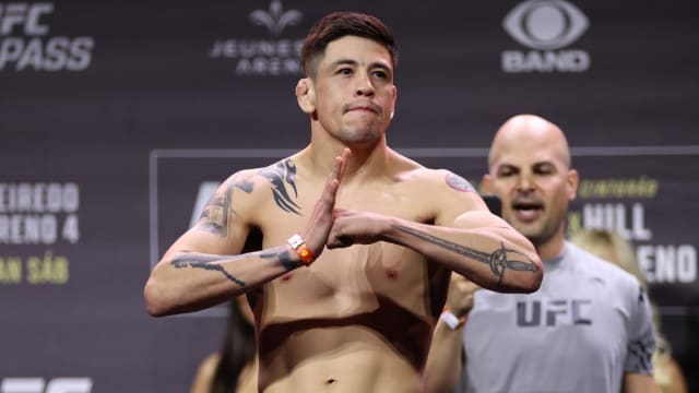 Brandon Moreno steps on the scale for UFC weigh-in day.