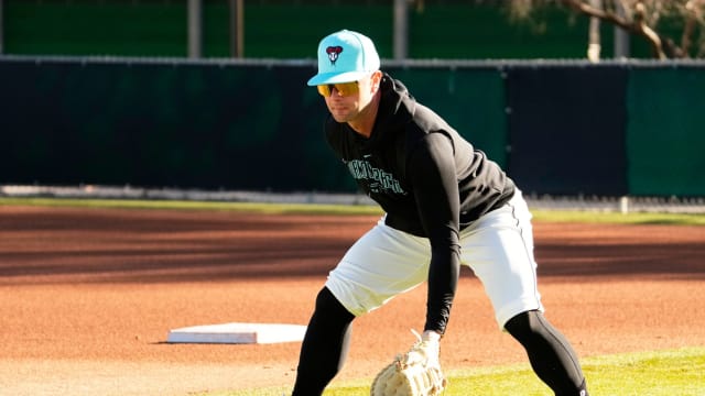 Christian Walker fielding baseballs at Spring Training Practice