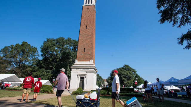Tailgaters arrive at Denny Chimes on the Alabama campus in Tuscaloosa, Ala., before the Ole Miss game on Saturday September 28, 2019. Pre511
