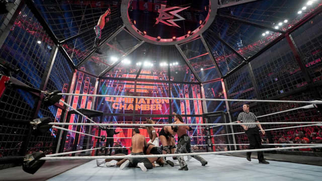 WWE superstars battle it out during the Elimination Chamber match.