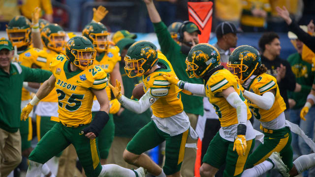 Jan 8, 2022; Frisco, TX, USA; The North Dakota State Bison celebrate an interception by safety Dawson Weber (2) against the Montana State Bobcats during the first half of the FCS Championship at Toyota Stadium. Mandatory Credit: Jerome Miron-USA TODAY Sports