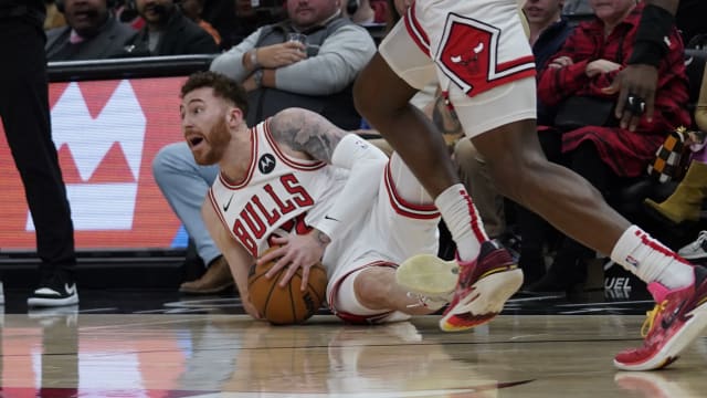 Chicago Bulls forward Onuralp Bitim (17) grabs a loose ball against the Cleveland Cavaliers during the second half at United Center. 
