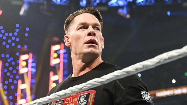 John Cena enters the ring for a WWE show.