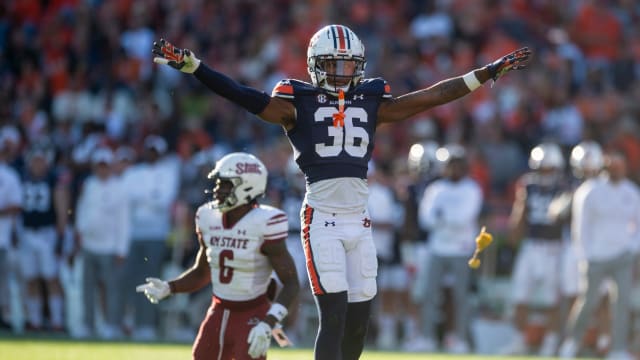 Auburn Tigers defensive back Jaylin Simpson (36) celebrates before being called for defensive pass interference call during the first quarter as Auburn Tigers take on New Mexico State Aggies at Jordan-Hare Stadium in Auburn, Ala., on Saturday, Nov. 18, 2023.