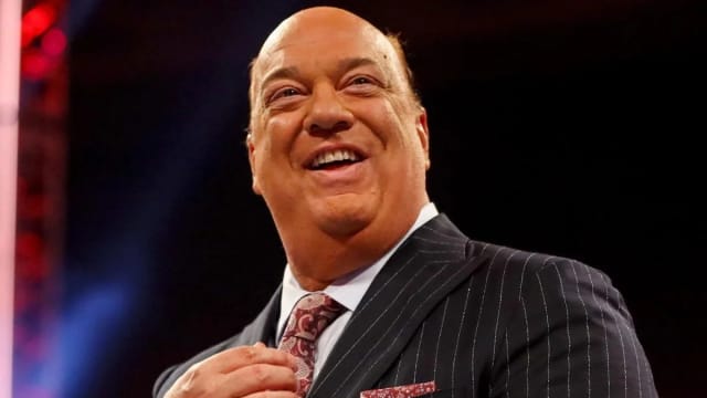 Paul Heyman inside a WWE ring, and he's all smiles.