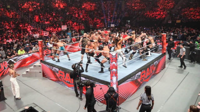 A brawl breaks out inside the ring on Monday Night Raw.