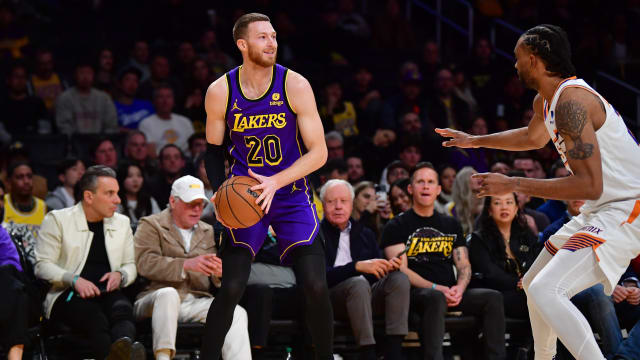 Jan 11, 2024; Los Angeles, California, USA; Los Angeles Lakers guard Dylan Windler (20) controls the ball against the Phoenix Suns during the second half at Crypto.com Arena. Mandatory Credit: Gary A. Vasquez-USA TODAY Sports