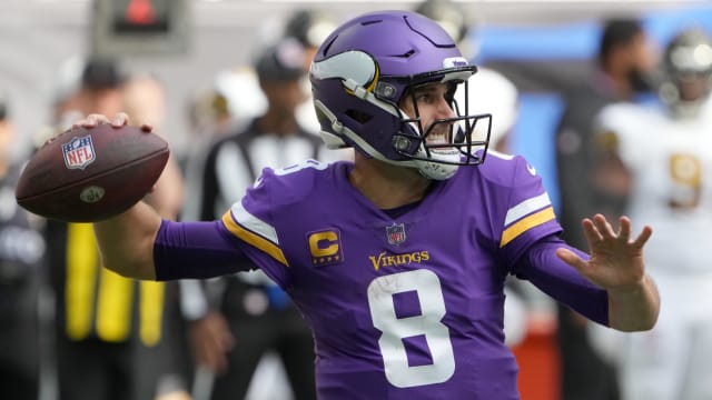 Minnesota Vikings quarterback Kirk Cousins (8) throws the ball in the first half against the New Orleans Saints.