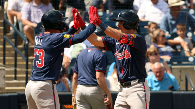 Mar 10, 2024; Tampa, Florida, USA; Atlanta Braves first baseman Luke Williams (74) is congratulated by Atlanta Braves left fielder Forrest Wall (73) after he hit a 2-run home run during the fourth inning against the New York Yankees at George M. Steinbrenner Field.