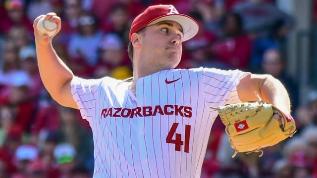 Razorbacks reliever Will McEntire throws a pitch against Missouri