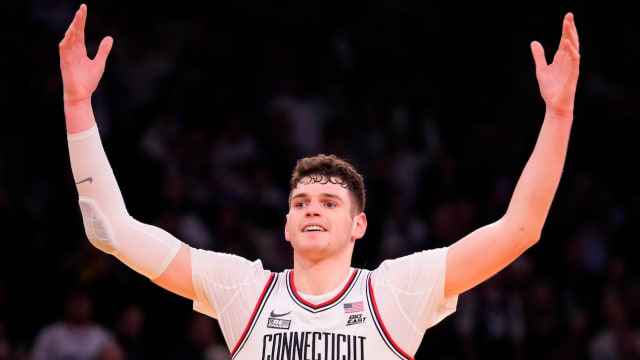 UConn Huskies center Donovan Clingan (32) celebrates as the clock winds down against Marquette Golden Eagles in the second half at Madison Square Garden in New York City on March 16, 2024.