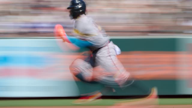 Aug 26, 2023; San Francisco, California, USA; Atlanta Braves outfielder Ronald Acuna Jr. steals third base against the San Francisco Giants during the third inning at Oracle Park.