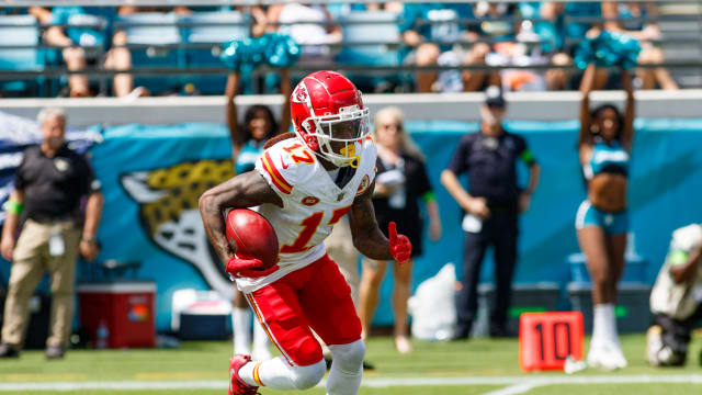 Sep 17, 2023; Jacksonville, Florida, USA; Kansas City Chiefs wide receiver Richie James (17) runs with the ball against Jacksonville Jaguars during the first quarter at EverBank Stadium. Mandatory Credit: Morgan Tencza-USA TODAY Sports  