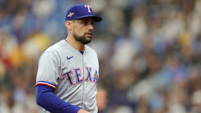 Oct 4, 2023; St. Petersburg, Florida, USA; Texas Rangers starting pitcher Nathan Eovaldi (17) leaves the mound at the end of the first inning against the Tampa Bay Rays during game two of the Wildcard series for the 2023 MLB playoffs at Tropicana Field. Mandatory Credit: Nathan Ray Seebeck-USA TODAY Sports