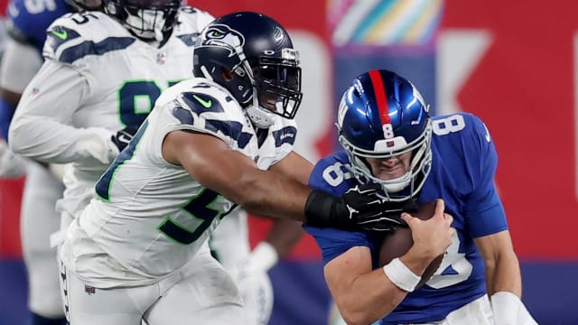New York Giants quarterback Daniel Jones (8) is tackled by Seattle Seahawks linebacker Bobby Wagner (54) during the fourth quarter at MetLife Stadium.