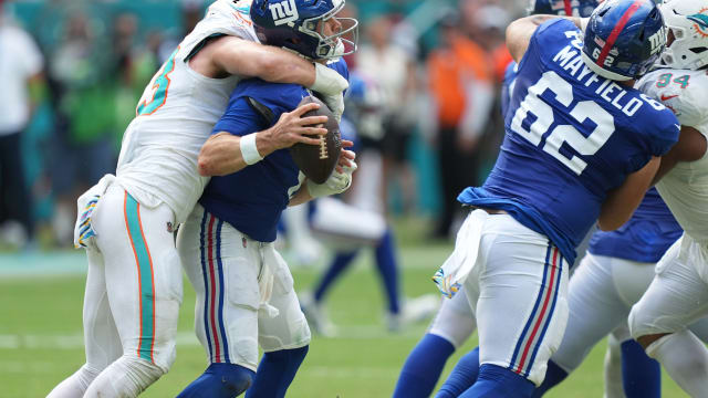 Miami Dolphins linebacker Andrew Van Ginkel (43) sacks New York Giants quarterback Daniel Jones (8) during the second half of an NFL game at Hard Rock Stadium in Miami Gardens, October 8, 2023.