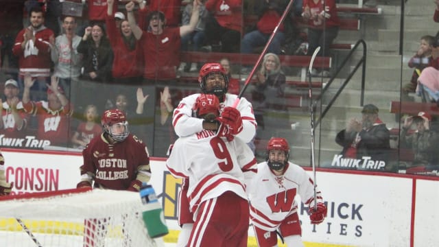 Wisconsin's Laila Edwards (10) hugs Ava Murphy (9) after Murphy's goal in the third period of Wisconsin's 12-2 victory over Boston College on Friday Oct. 6, 2023 at LaBahn Arena in Madison, Wis.
