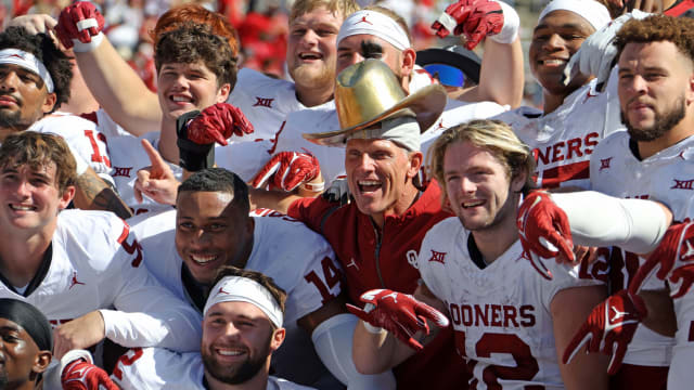 Oklahoma coach Brent Venables poses for a photo wearing the Golden Hat Trophy after the Red River Rivalry college football game between the University of Oklahoma Sooners (OU) and the University of Texas (UT) Longhorns at the Cotton Bowl in Dallas, Saturday, Oct. 7, 2023. Oklahoma won 34-30.