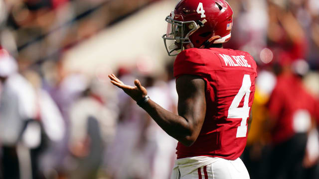 Oct 14, 2023; Tuscaloosa, Alabama, USA; Alabama Crimson Tide quarterback Jalen Milroe (4) reacts to his 79 yard pass for a touchdown during the first quarter against the Arkansas Razorbacks at Bryant-Denny Stadium.