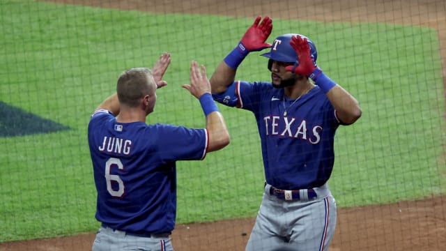 Texas Rangers center fielder Leody Taveras, right, celebrates with third baseman Josh Jung after hitting a home run during the fifth inning of Game 1 of the ALCS Sunday night against the Houston Astros at Minute Maid Park.