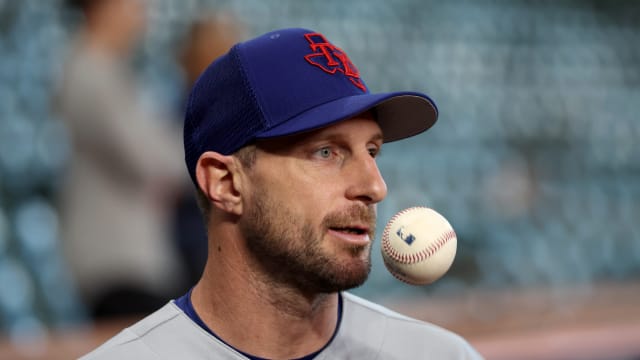 Texas Rangers pitcher Max Scherzer flips a ball before Game 1 of the ALCS at Minute Maid Park. Scherzer returns from the injury list to start Game 3 against the Houston Astros at 7:03 p.m. Wednesday at Globe Life Field.
