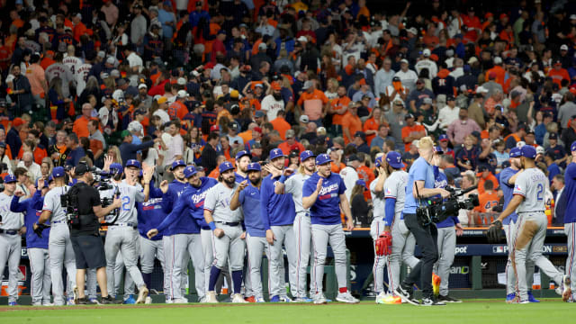 Oct 16, 2023; Houston, Texas, USA; The Texas Rangers celebrate after defeating the Houston Astros in game two of the ALCS for the 2023 MLB playoffs at Minute Maid Park. Mandatory Credit: Thomas Shea-USA TODAY Sports