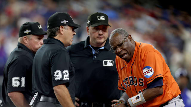 Oct 20, 2023; Arlington, Texas, USA; Houston Astros manager Dusty Baker (12) argues with umpires after Texas Rangers right fielder Adolis Garcia (not pictured) was hit by a pitch and Astros pitcher Bryan Abreu (not pictured) was ejected during the eighth inning of game five in the ALCS for the 2023 MLB playoffs at Globe Life Field. Mandatory Credit: Andrew Dieb-USA TODAY Sports