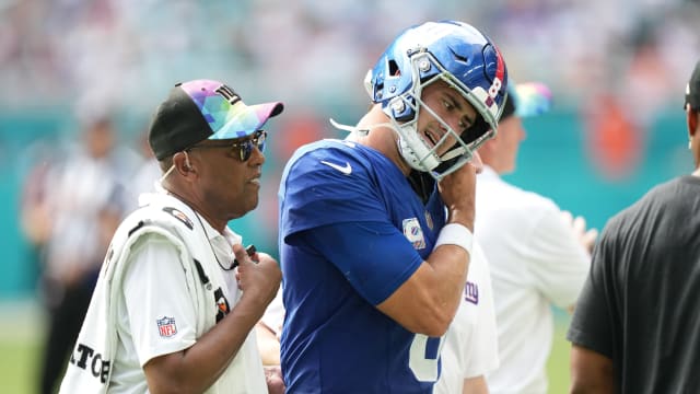 New York Giants quarterback Daniel Jones (8) leaves the game with an injury against the Miami Dolphins during the second half of an NFL game at Hard Rock Stadium in Miami Gardens, October 8, 2023.