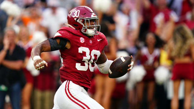 Oct 21, 2023; Tuscaloosa, Alabama, USA; Alabama Crimson Tide linebacker Jihaad Campbell (30) picks up a fumble and ran it back for a touchdown against the Tennessee Volunteers during the second half at Bryant-Denny Stadium.