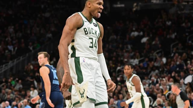 Milwaukee Bucks forward Giannis Antetokounmpo (34) reacts after scoring a basket in the third quarter against the Memphis Grizzlies