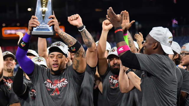 Arizona Diamondbacks second baseman Ketel Marte holds the National League Championship Series Most Valuable Player Award as part of the celebration at Citizens Bank Park in Philadelphia. The D-backs won 4-2 to advance to the World Series.