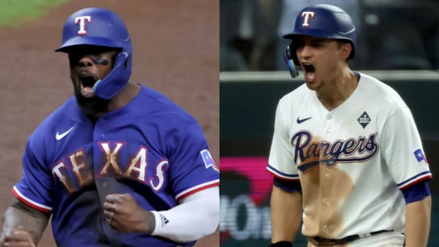 Texas Rangers shortstop Corey Seager, right, reacts after hitting a two-run home run in the ninth inning in Game 1 of the World Series Friday at Globe Life Field in Arlington. Outfielder Adolis Garcia react to a home run in the ALCS against the Astros.