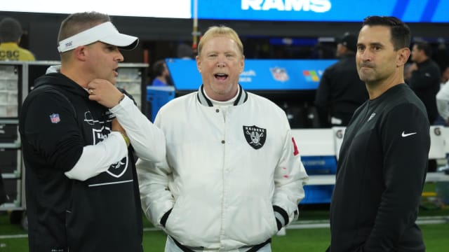 Dec 8, 2022; Inglewood, California, USA; Las Vegas Raiders coach Josh McDaniels (left), owner Mark Davis (center) and general manager Dave Ziegler talk before the game against the Los Angeles Rams at SoFi Stadium.