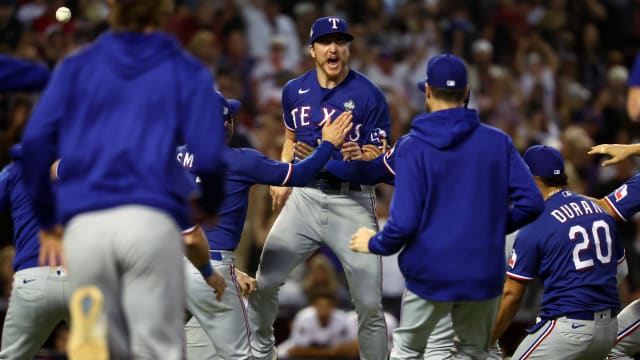 Texas Rangers relief pitcher Josh Sborz reacts with teammates after defeating the Arizona Diamondbacks in Game 5 of the 2023 World Series Wednesday night at Chase Field.