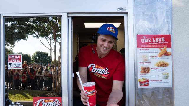 Texas Rangers' World Series MVP Corey Seager served chicken at an Arlington Raising Cane's moments after the team's championship parade and celebration in front of about 500,000 fans near Globe Life Field.