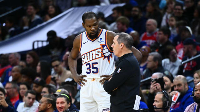 Phoenix Suns forward Kevin Durant (35) stands with head coach Frank Vogel in the third quarter against the Philadelphia 76ers at Wells Fargo Center.