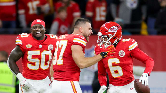 Nov 5, 2023; Frankfurt, Germany, ; Kansas City Chiefs tight end Travis Kelce (87) congratulates safety Bryan Cook (6) after scoring a touchdown against the Miami Dolphins in the second quarter during an NFL International Series game at Deutsche Bank Park. Mandatory Credit: Nathan Ray Seebeck-USA TODAY Sports  