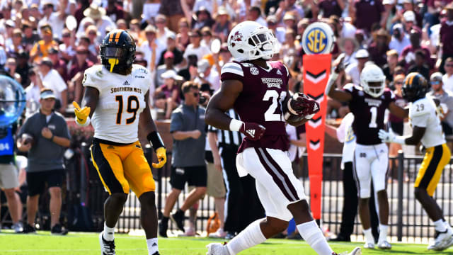 Sep 7, 2019; Starkville, MS, USA; Mississippi State Bulldogs running back Nick Gibson (21) reacts after scoring a touchdown against the Southern Miss Golden Eagles during the second quarter at Davis Wade Stadium. Mandatory Credit: Matt Bush-USA TODAY Sports