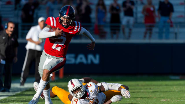 Oct 6, 2018; Oxford, MS, USA; Louisiana Monroe Warhawks defensive back Jabari Johnson (24) can only watch after Mississippi Rebels quarterback Matt Corral (2) escapes his grasp and runs for a 61-yard touchdown during the second half at Vaught-Hemingway Stadium. Mandatory Credit: Vasha Hunt-USA TODAY Sports