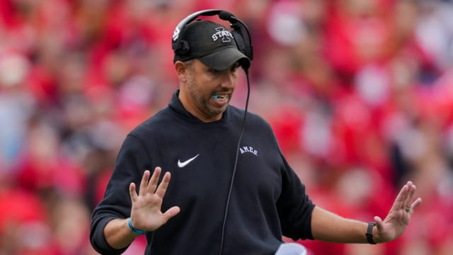 Oct 14, 2023; Cincinnati, Ohio, USA; Iowa State Cyclones head coach Matt Campbell reacts as he stands on the field against the Cincinnati Bearcats in the first half at Nippert Stadium. Mandatory Credit: Aaron Doster-USA TODAY Sports