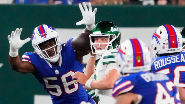 Jets' QB Zach Wilson hangs in the pocket against the Bills